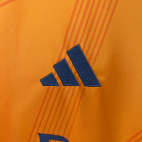 Camisa Real Madrid Away 2024/25 - Torcedor Adidas Masculina - Laranja/Preta